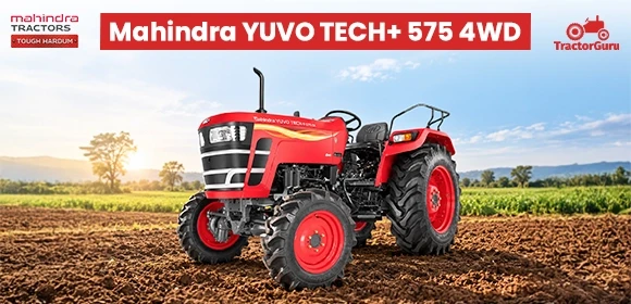Red Mahindra Yuvo Tech+ 575 4WD tractor in a farm.